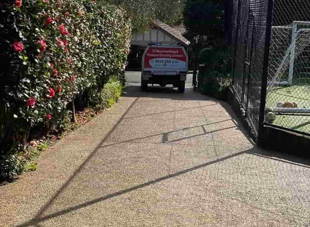 Pressure cleaning paver driveway in Sydney to remove grime and moss