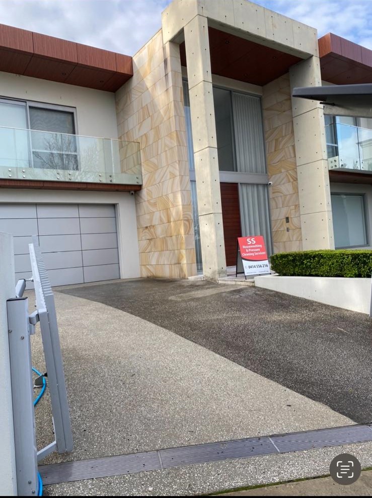Driveway cleaning Sydney using high pressure washing to remove oil and stains